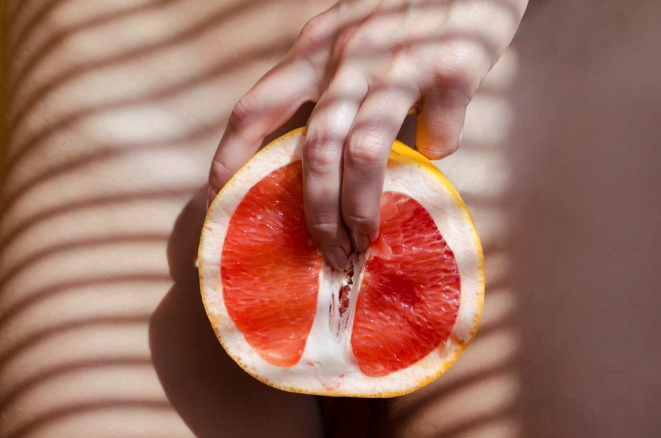 A Woman Is Holding A Grapefruit By Her Body Concept Masturbation
